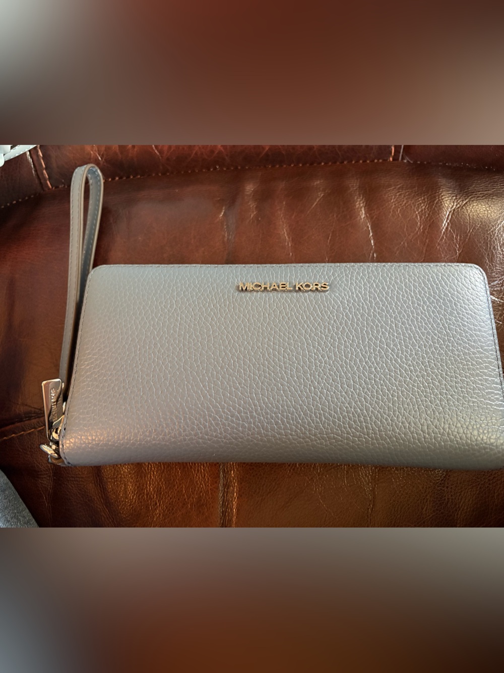 Michael Kors Blue Pebbled Leather Wristlet Wallet with Gold Logo